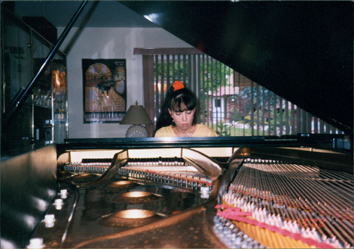 Me at home, circa 2004, with my then 9ft. Balswin Concert Grand